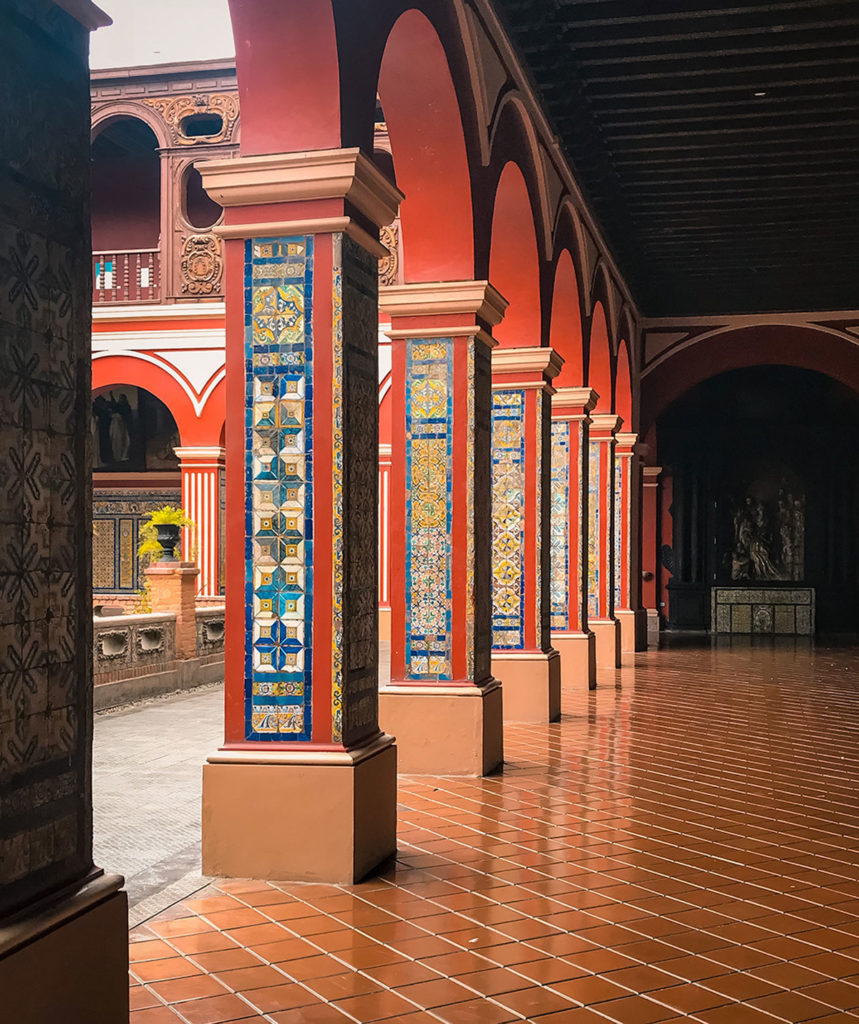 Adorned columns of the Domingo Courtyard - Peru