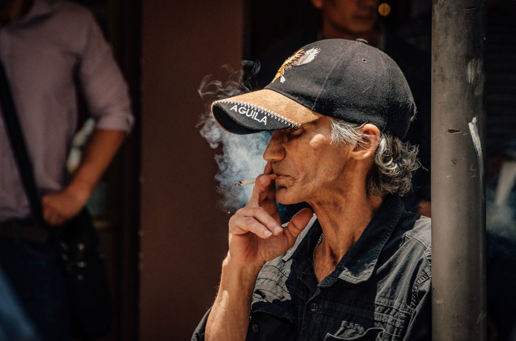Elderly man smoking - Medellin