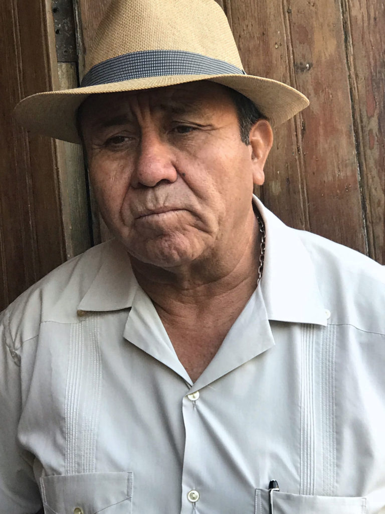 Closeup of a man in straw fedora - Peru