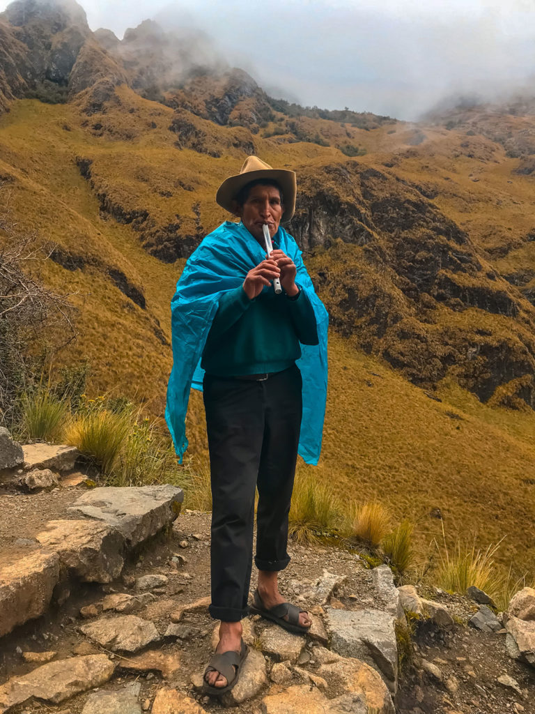 Man playing pan flute - Inca Trail