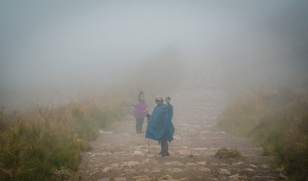 Khadija on foggy trail - Inca Trail