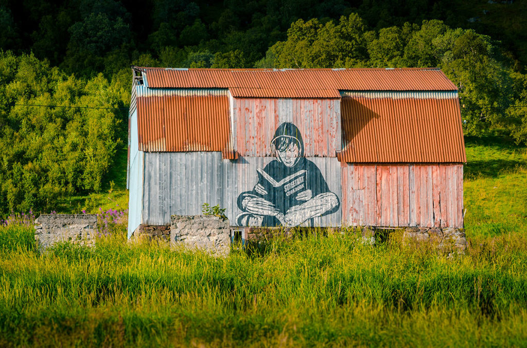 Street Art Cookbook mural on an old building - Andøya Island