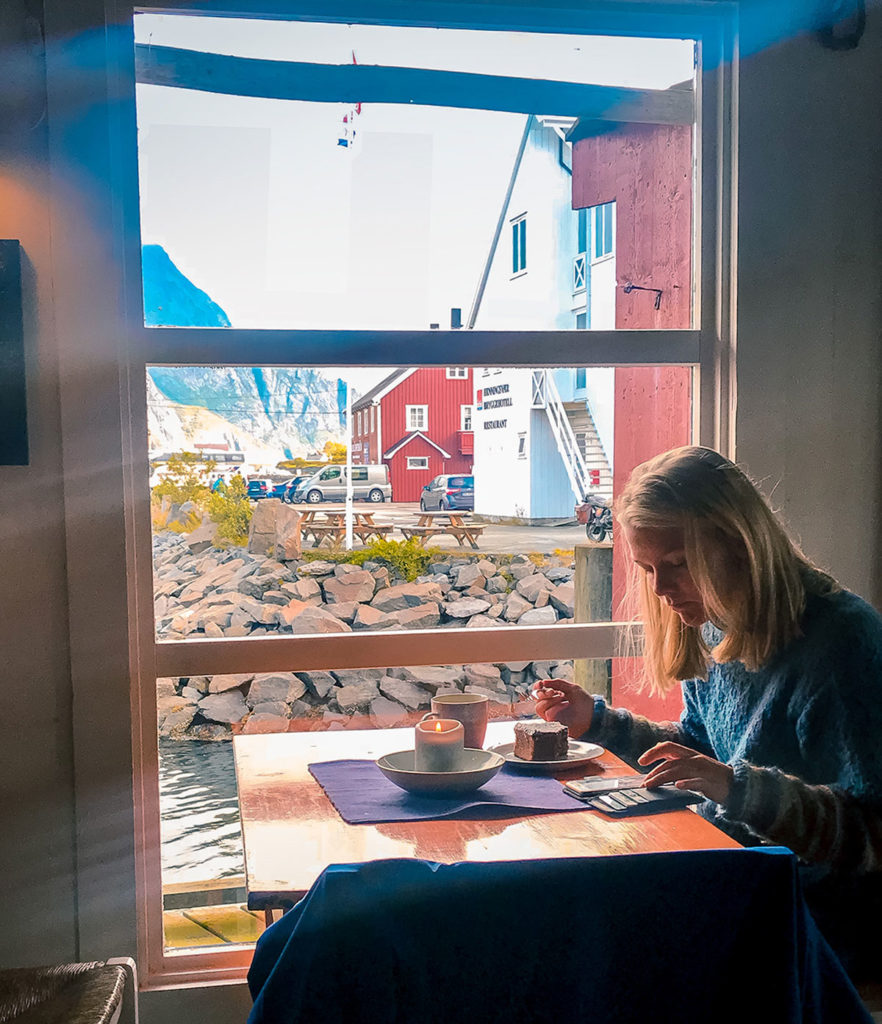 Lady by the window inside a coffee shop - Henningsvær