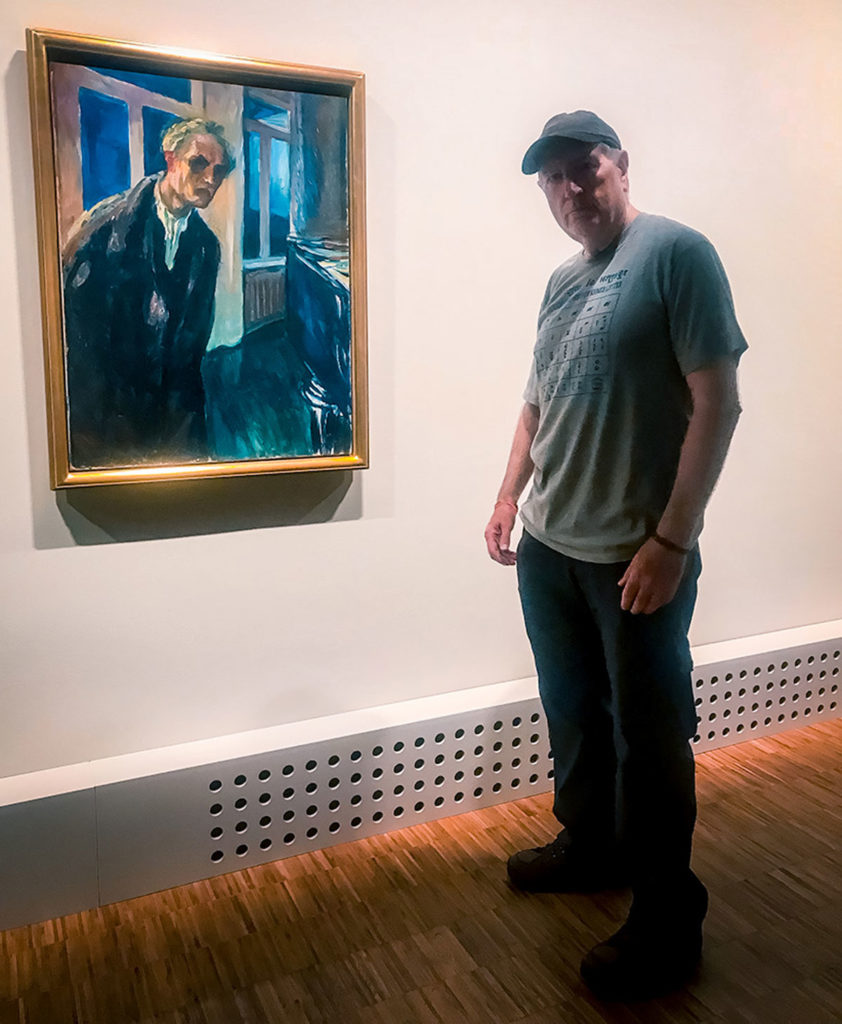 Ed beside the self portrait of Edvard Munch - Munch Museum