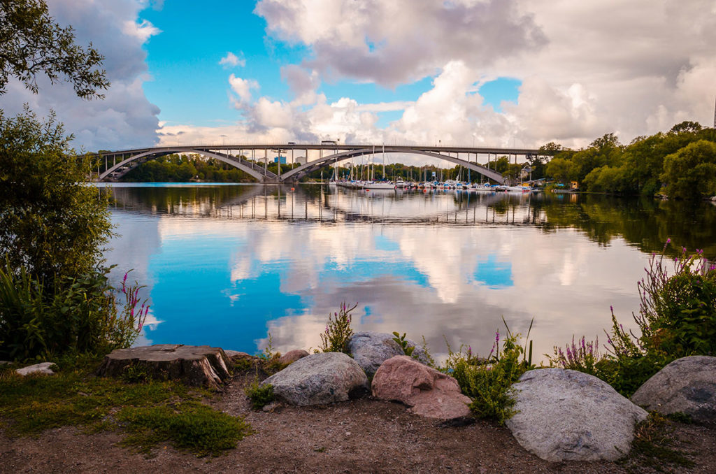 Beautiful reflection of a bridge on the Riddarfjärden lake 