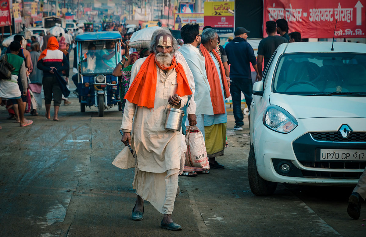 Sadhu on a crowded road - India