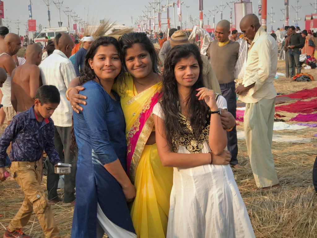 Three young women during the Kumbh Mela - India