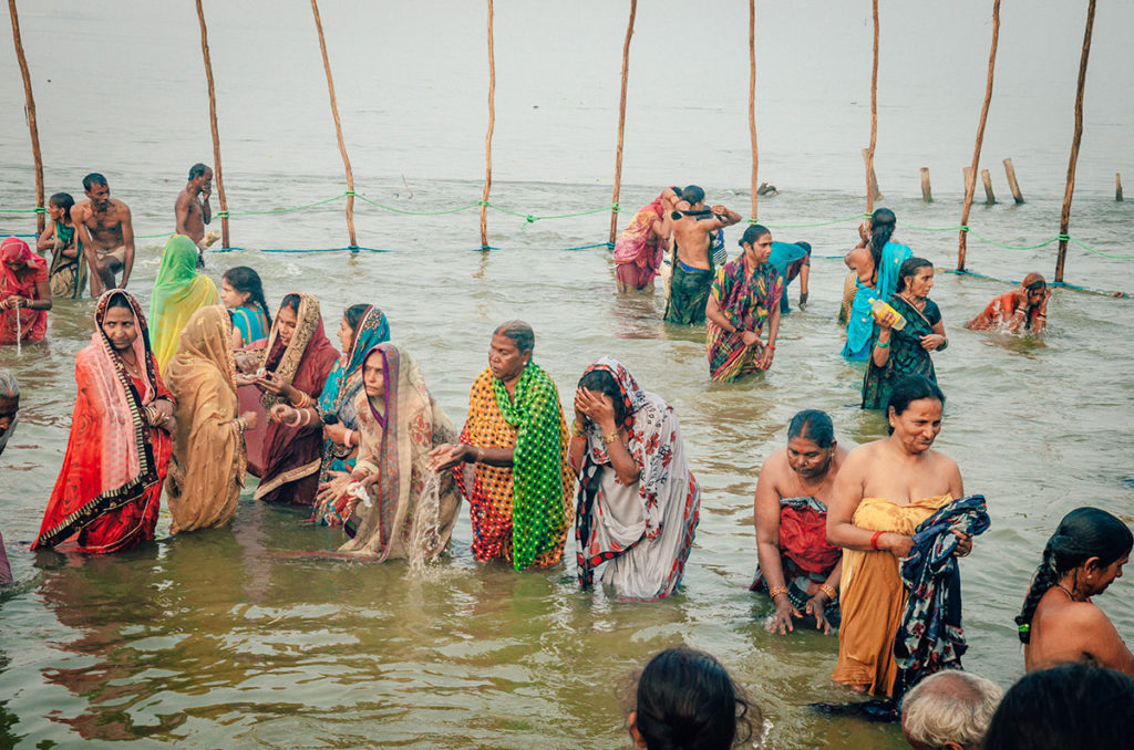 Hindu pilgrims bathing in the river - India
