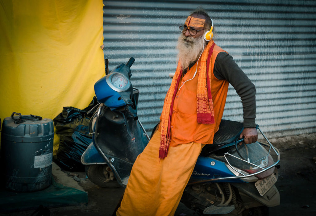 Sadhu with headphones - India