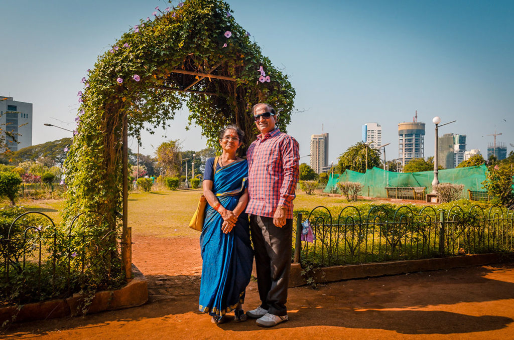 Elderly couple in front of the Hanging Garden - Mumbai