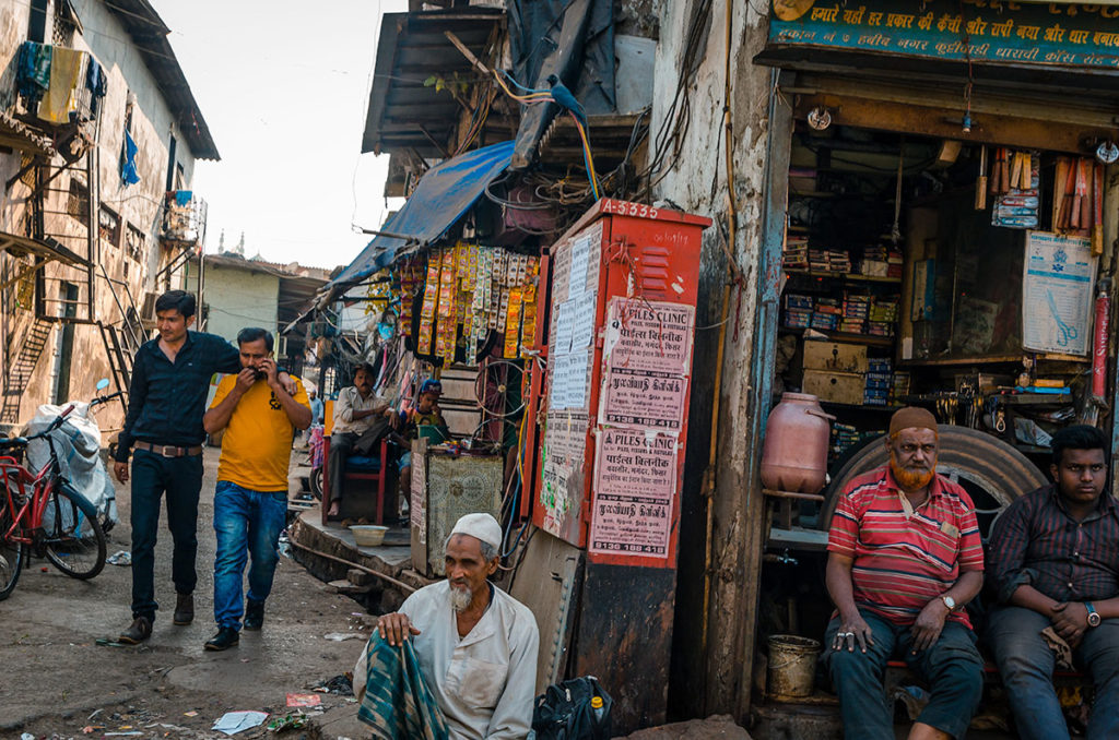 Men around a small shop - Dharavi