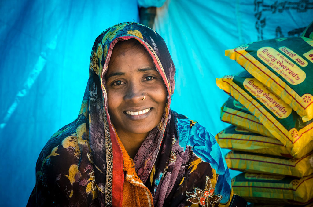 Smiling food vendor woman - India