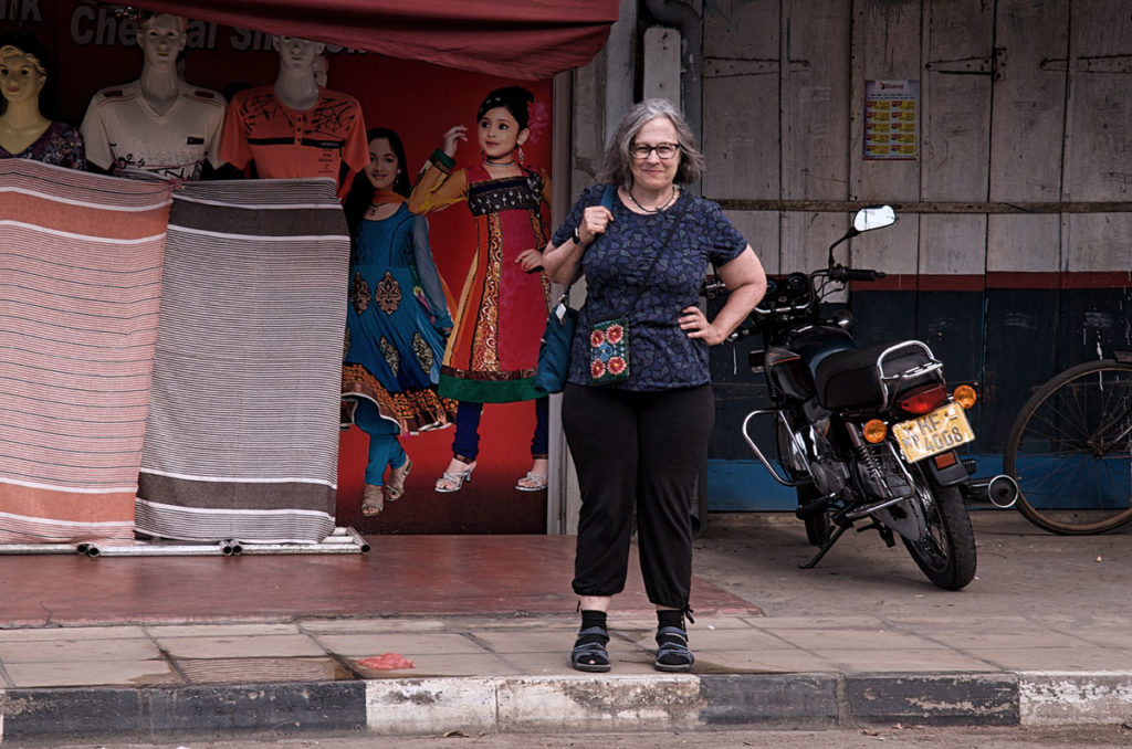 Caitlyn in front of a fabric shop - Jaffna
