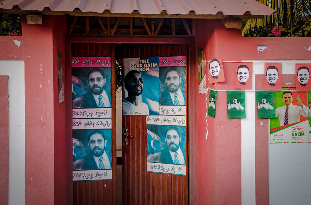 Elections posters on a wall - Dhigurah