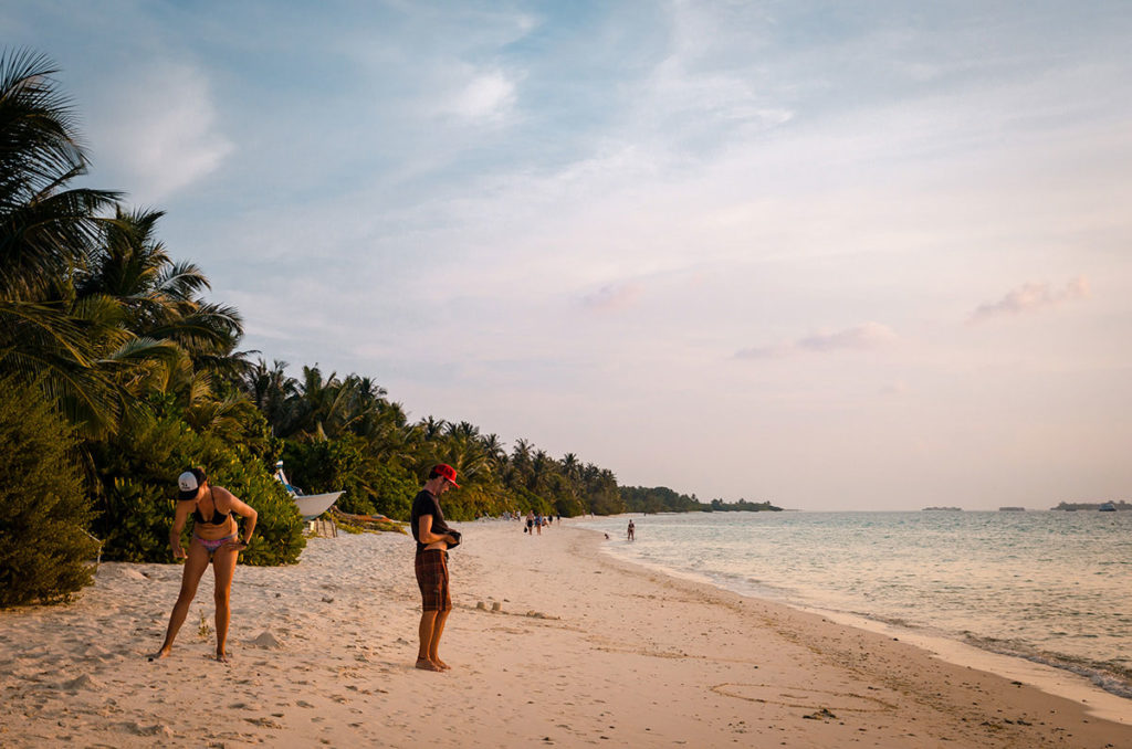 Tourist on a long beach - Dhigurah