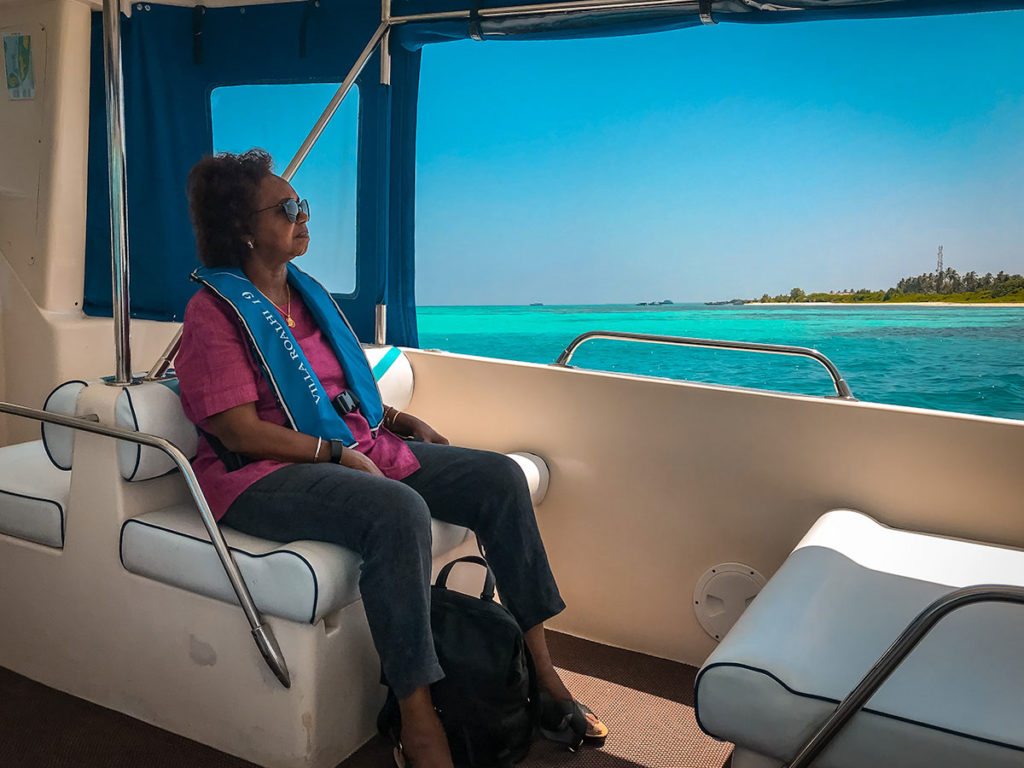 Khadija on a boat to Dhigurah - Maldives