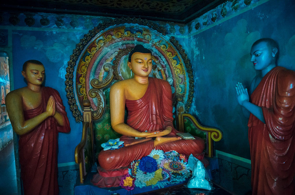  Buddha statues in a blue room - Dhowa Rock Temple