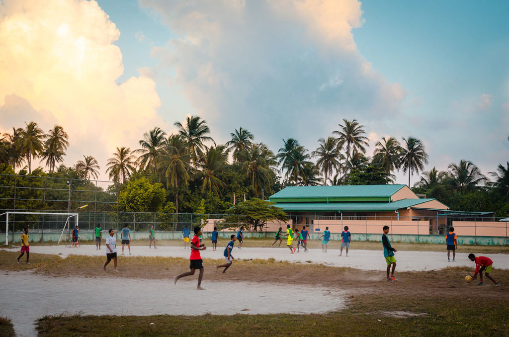 Boys playing soccer - Maldives