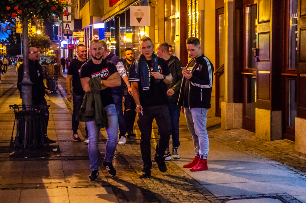 Guys Partying at Night in Wroclaw
